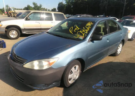 2002 Toyota Camry Le from USA, damaged, VIN 4T1BE32K32U534904